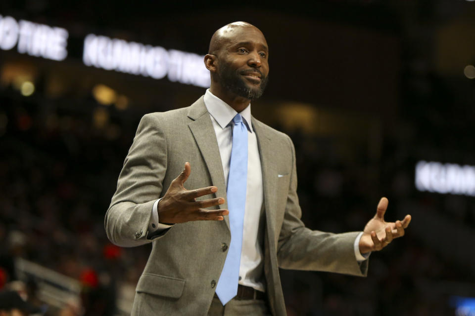 Atlanta Hawks head coach Lloyd Pierce reacts to a referee in the first half of an NBA basketball game against the Indiana Pacers, Friday, Dec. 13, 2019, in Atlanta. (AP Photo/Brett Davis)