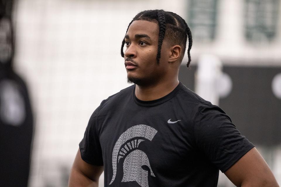 Michigan State running back Jaren Mangham works out in East Lansing.