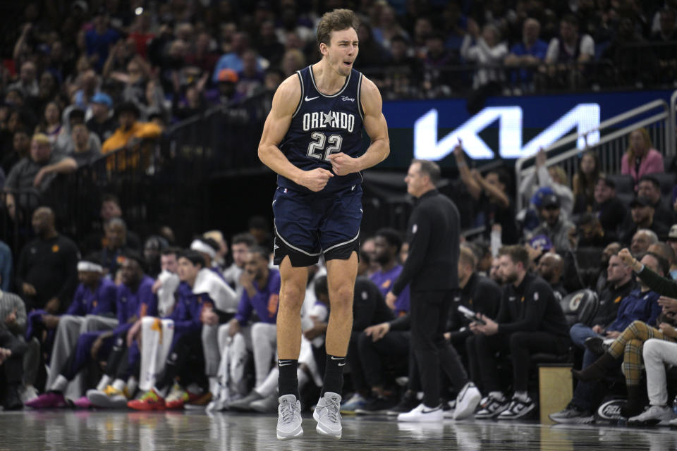 Orlando Magic forward Franz Wagner (22) celebrates after his 3-point basket during the second half of an NBA basketball game against the Phoenix Suns, Sunday, Jan. 28, 2024, in Orlando, Fla. (AP Photo/Phelan M. Ebenhack)