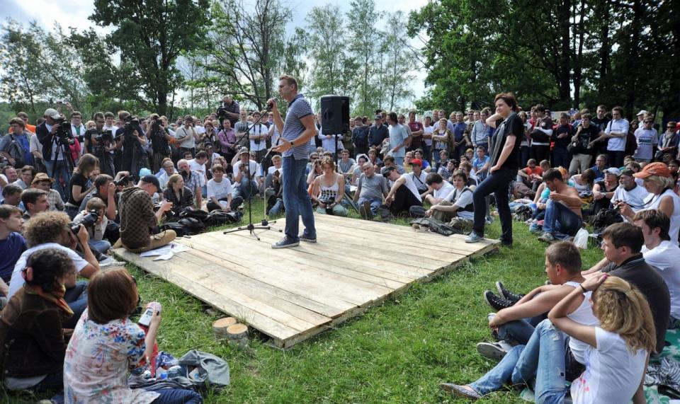 PHOTO: In this June 18, 2011, file photo, Russian opposition politician and blogger Alexey Navalny speaks to activists in a summer camp called Anti-Seliger in the Khimki forest, outside Moscow. (AFP via Getty Images, FILE)