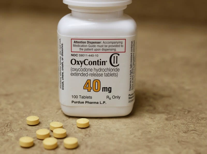 FILE PHOTO: A bottle of prescription painkiller OxyContin, 40mg pills, made by Purdue Pharma L.D. sit on a counter at a local pharmacy in Provo