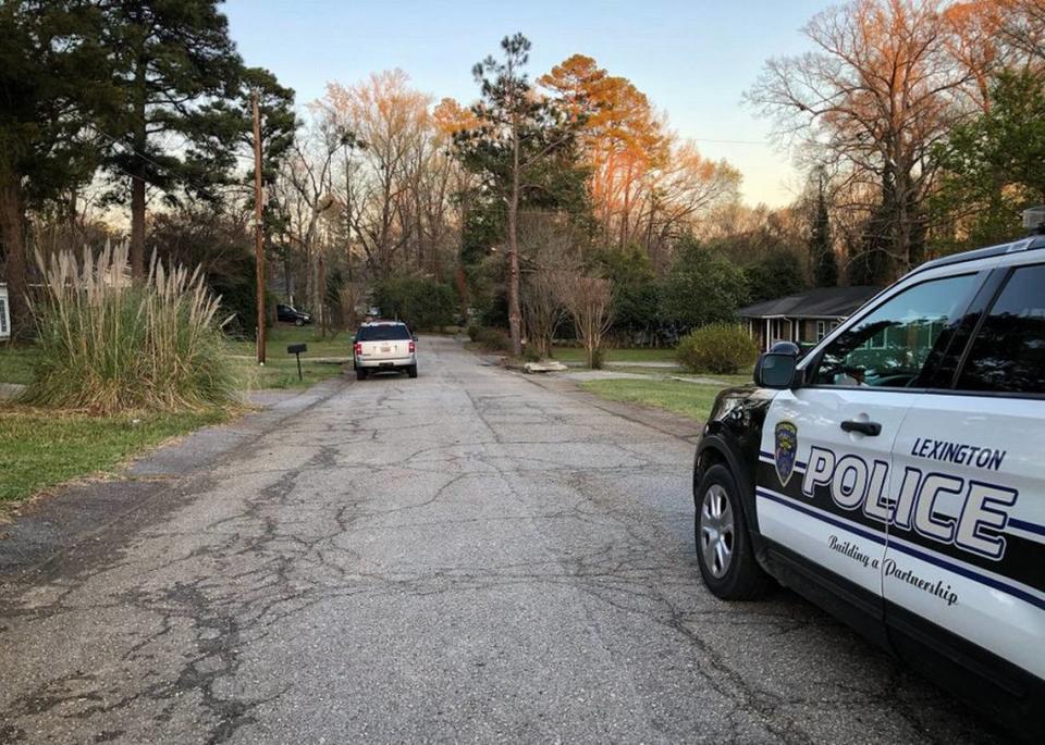 The Lexington Police Department has blocked off a neighborhood after a man barricaded himself inside a home and threatened to hurt himself.