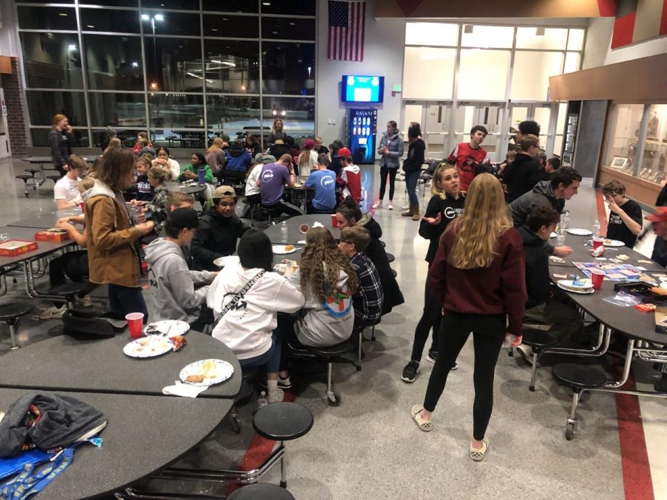 Students gather for a "Friendsgiving" at Gilbert High School hosted by Moving Forward on Nov. 18, 2022. Moving Forward seeks to improve mental health by building social connections between students that might not otherwise exist.