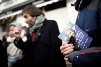 French mathematician Cedric Villani, member of Parliament and candidate for Paris mayoral election, campaigns in Paris
