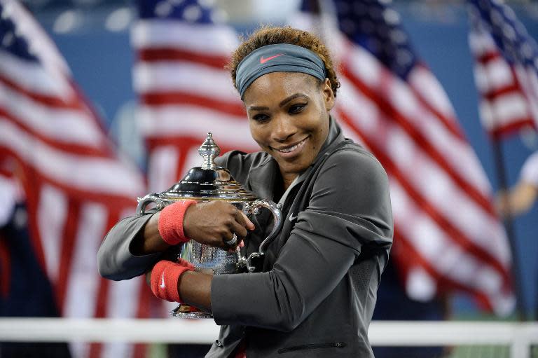 Serena Williams celebrates her win over Victoria Azarenka at the US Open in New York on September 8, 2013