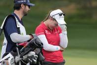 Jennifer Kupcho, right, reacts after a shot on the 15th hole during the third day of round-robin play in the LPGA Bank of Hope Match Play golf tournament Friday, May 27, 2022, in North Las Vegas, Nev. (AP Photo/John Locher)