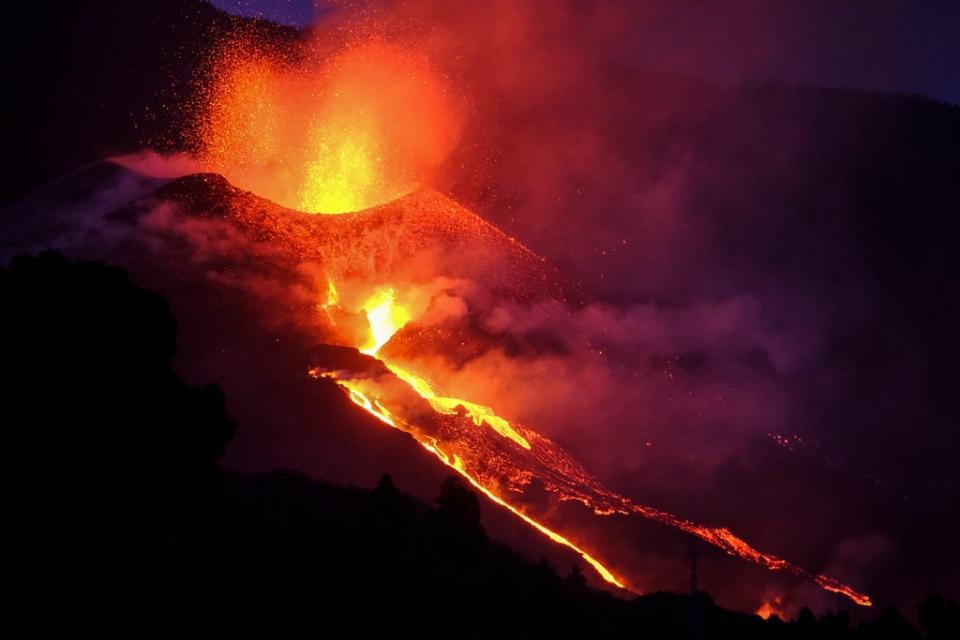 Three fissures have now cracked open since the Cumbre Vieja crater erupted on La Palma island on 19 September (AP)