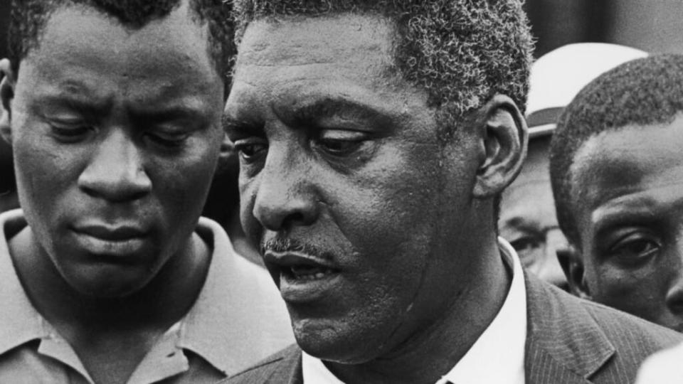 In this July 1964 photo, gay civil rights activist Bayard Rustin (center) talks to a reporter during the Harlem Riots in Manhattan. Acclaimed director George C. Wolfe is set to direct Netflix’s new biopic, for the Obamas’ Higher Ground and Netflix. (Photo by Express/Hulton Archive/Getty Images)