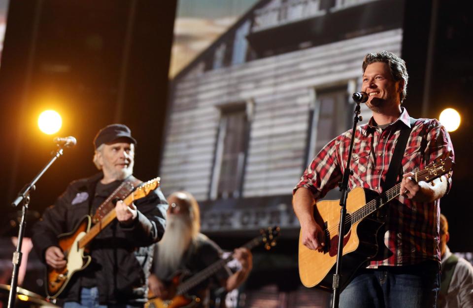 Blake Shelton, right, and Merle Haggard perform during rehearsals for the 56th Annual Grammy Awards at the Staples Center, on Friday, Jan. 24, 2014, in Los Angeles. The Grammy Awards will take place on Sunday, Jan. 26., 2014. (Photo by Matt Sayles/Invision/AP)