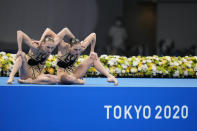 Svetlana Kolesnichenko and Svetlana Romashina of Russian Olympic Committee compete in the duet free routine final at the the 2020 Summer Olympics, Wednesday, Aug. 4, 2021, in Tokyo, Japan. (AP Photo/Alessandra Tarantino)