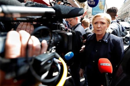 Marine Le Pen, French National Front (FN) political party leader and candidate for French 2017 presidential election, arrives at her campaign headquarters in Paris, France, April 28, 2017. REUTERS/Charles Platiau