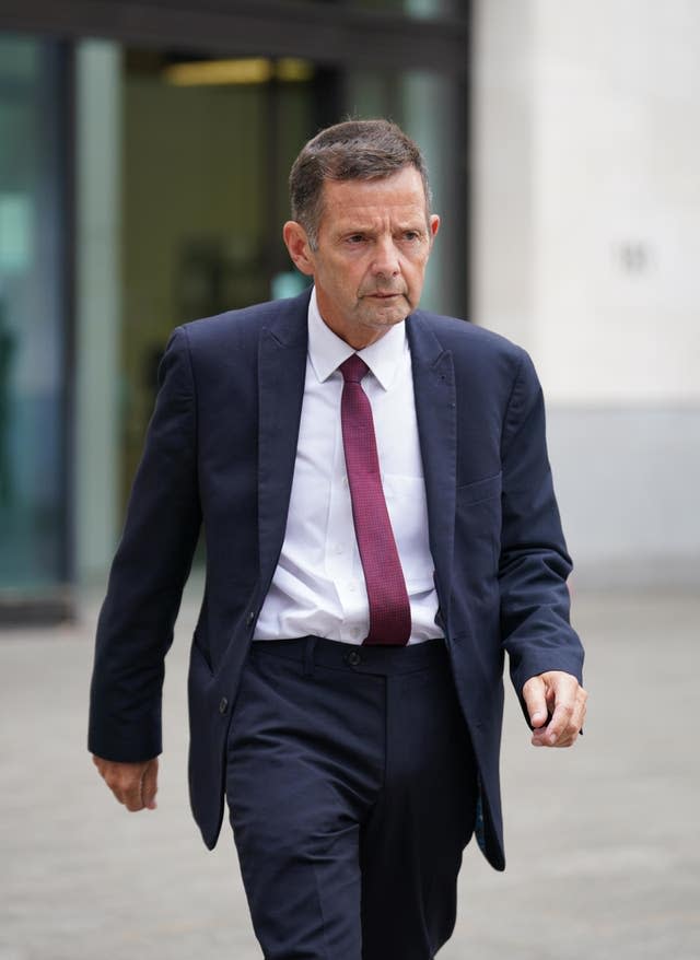 Michael Lockwood walking outside a court 