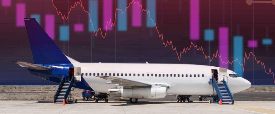 Falling charts next to the plane. Concept - shares fall airlines. Losses of airlines. Reduced demand for tickets. Concept - financial losses of aircraft manufacturers. Devastation. Bankruptcy