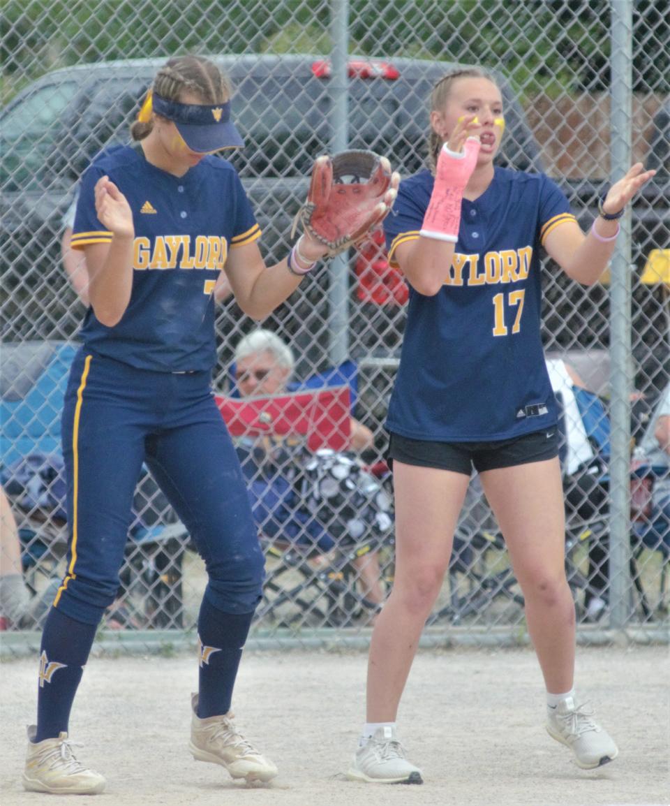 Aubrey Jones (left) and Jayden Jones (right) dance prior to an MHSAA regional softball matchup between Gaylord and Freeland on Saturday, June 10, 2023 in Cadillac, Mich.