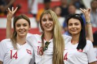 <p>Poland’s fans cheer prior to the Russia 2018 World Cup Group H football match between Poland and Senegal at the Spartak Stadium in Moscow on June 19, 2018. (Photo by FRANCK FIFE / AFP) </p>