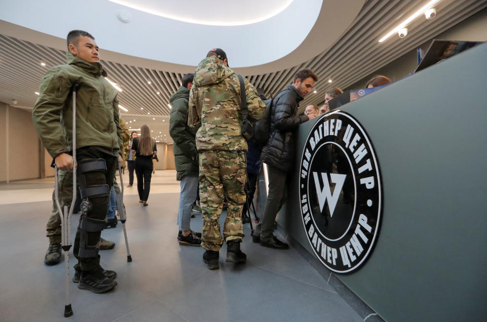 People visit PMC Wagner Centre, which is a project implemented by the businessman and founder of the Wagner private military group Yevgeny Prigozhin, during the official opening of the office block in Saint Petersburg, Russia, November 4, 2022. REUTERS/Igor Russak