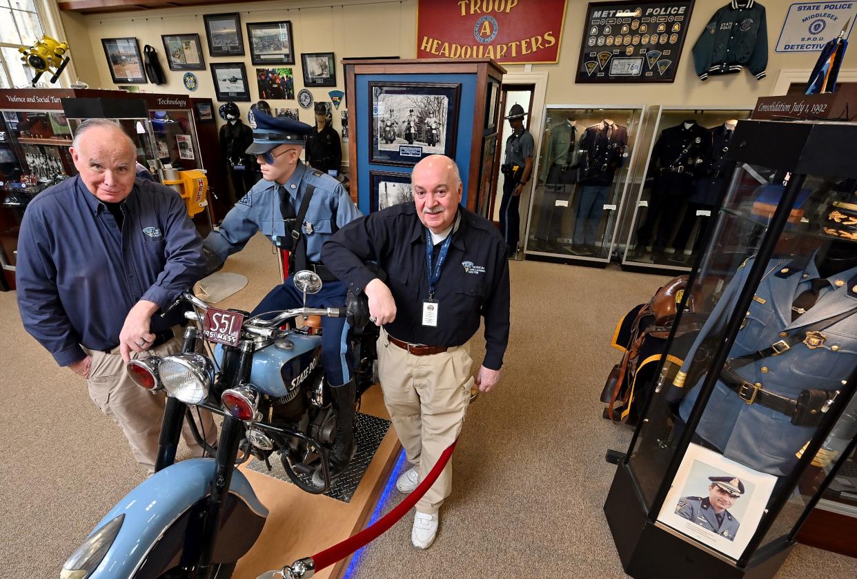 Steve Byron, president of the board of directors, and volunteer Paul Landry, at the Massachusetts State Police Museum and Learning Center.