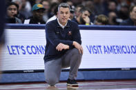 Virginia head coach Tony Bennett looks on during the first half of an NCAA college basketball game against Syracuse in Syracuse, N.Y., Monday, Jan. 30, 2023. (AP Photo/Adrian Kraus)