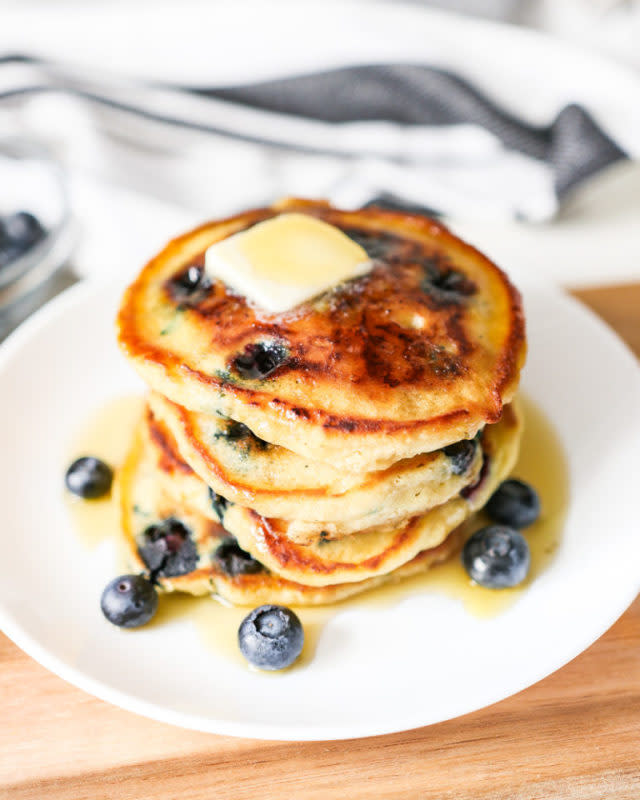 <p>Marsha Eileen</p><p>These classic homemade blueberry pancakes are a staple for any breakfast or brunch menu. They’re soft, fluffy and made with fresh, juicy blueberries delivering a taste of Spring in every bite.</p><p><strong>Get the recipe: <a href="https://marshaeileen.com/blueberry-pancakes/" rel="nofollow noopener" target="_blank" data-ylk="slk:Blueberry Pancakes;elm:context_link;itc:0;sec:content-canvas" class="link ">Blueberry Pancakes</a></strong></p>