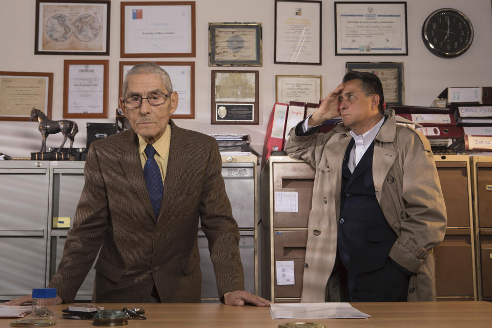 This image released by Gravitas Ventures shows Romulo Aitken, right, and Sergio Chamy in a scene from "The Mole Agent." (Alvaro Reyes/Gravitas Ventures via AP)