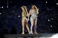 Shakira, left, and Jennifer Lopez perform during halftime of the NFL Super Bowl 54 football game between the Kansas City Chiefs and the San Francisco 49ers Sunday, Feb. 2, 2020, in Miami Gardens, Fla. (AP Photo/Patrick Semansky)