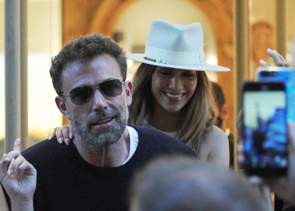 Jennifer Lopez and her husband Ben Affleck spotted shopping in Milan. A huge crowd waited outside the Brunello Cucinelli store to catch a glimpse of the newlyweds on their second honeymoon. Pictured: Ben Affleck,Jennifer Lopez
Ref: SPL5334477 250822 NON-EXCLUSIVE
Picture by: Mimmo Carriero/IPA / SplashNews.com Splash News and Pictures
USA: +1 310-525-5808
London: +44 (0)20 8126 1009
Berlin: +49 175 3764 166
photodesk@splashnews.com World Rights, No France Rights, No Italy Rights, No Portugal Rights, No Spain Rights 