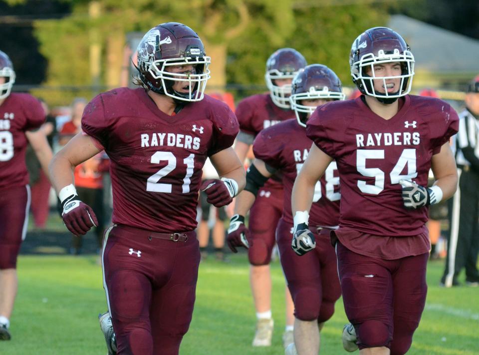 Landon Swanson (21), Nate Claflin (54) and the rest of the Charlevoix football team might be comfortable in, but they would be a lot more comfortable if they could rack up playoff points for home field advantage for more than a week.