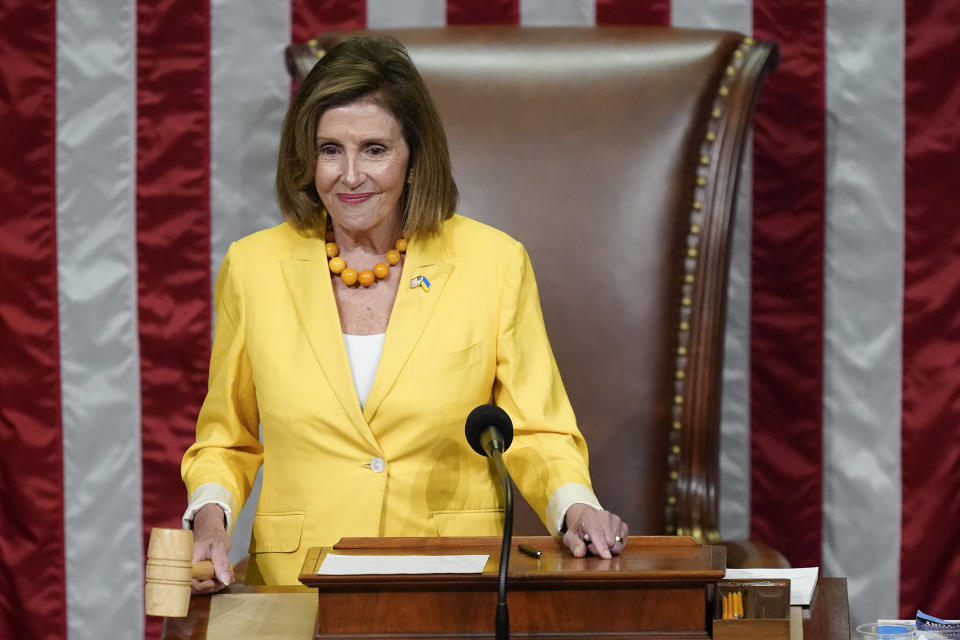 House Speaker Nancy Pelosi of Calif., finishes the vote to approve the Inflation Reduction Act in the House chamber at the Capitol in Washington, Friday, Aug. 12, 2022. A divided Congress gave final approval Friday to Democrats' flagship climate and health care bill. (AP Photo/Patrick Semansky)