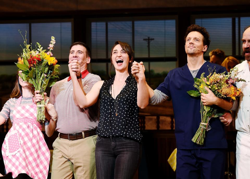 David Josefsberg, Sara Bareilles and Jason Mraz take a bow at the curtain call of Broadway's "Waitress" at The Brooks Atkinson Theatre on November 3, 2017 in New York City.