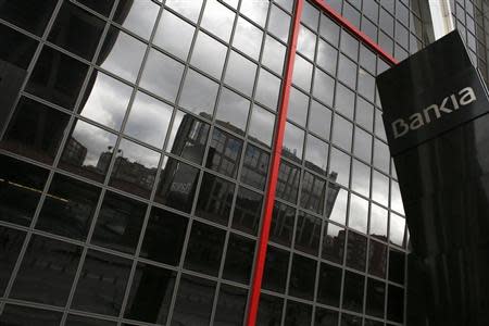 The logo for Spanish nationalized lender Bankia is pictured outside its headquarters in Madrid March 22, 2013. REUTERS/Juan Medina