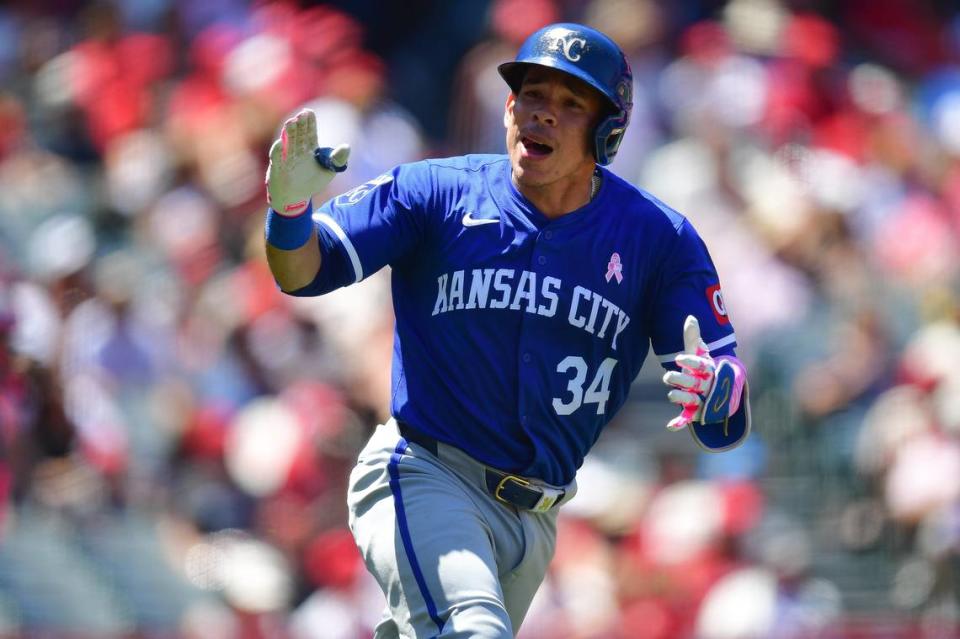 Royals catcher Freddy Fermin celebrates on his way to first after driving in Kansas City’s first run of Sunday’s game against the Los Angeles Angels at Angel Stadium.