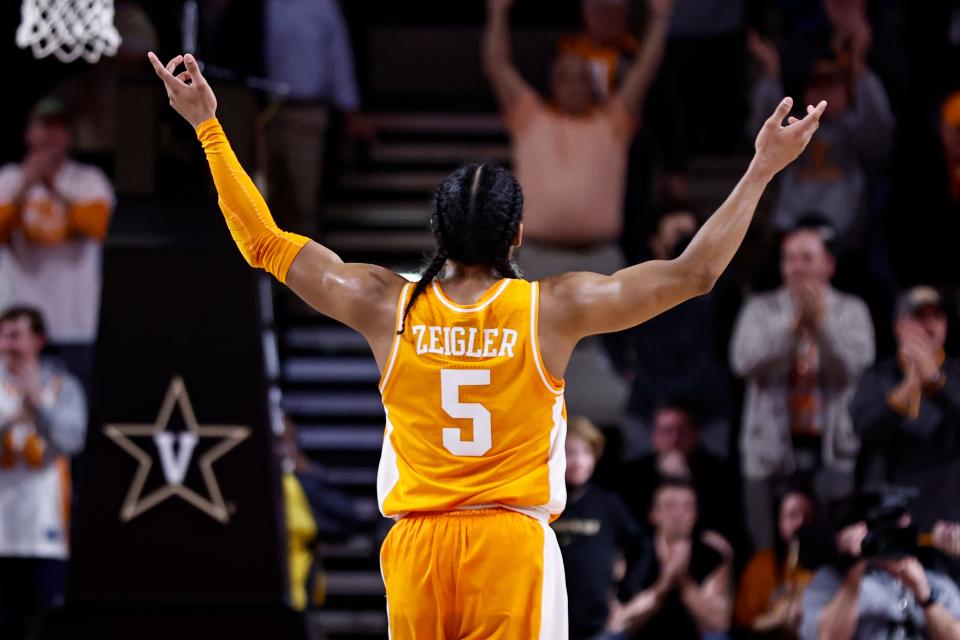 Tennessee guard Zakai Zeigler (5) reacts to the fans during an NCAA college basketball game against Vanderbilt Tuesday, Jan. 18, 2022, in Nashville, Tenn. Tennessee won 68-60. (AP Photo/Wade Payne)