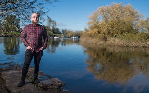 Aaron Lewis who fished out a Second World War explosive from the River Severn near Tewkesbury using a magnet - Credit: SWNS