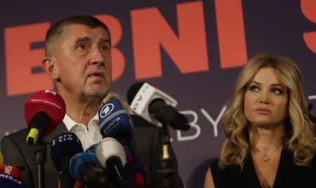 The leader of ANO party Andrej Babis and his wife Monika attend a news conference at the party's election headquarters after the country’s parliamentary elections in Prague, Czech Republic October 21, 2017. REUTERS/David W Cerny