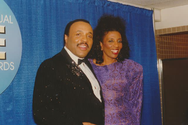 <p>Clarence Gatson Collection/Gado/Getty</p> Andraé Crouch and Sandra Crouch posing after accompanying Jennifer Holiday during an award ceremony performance in San Francisco in 1985