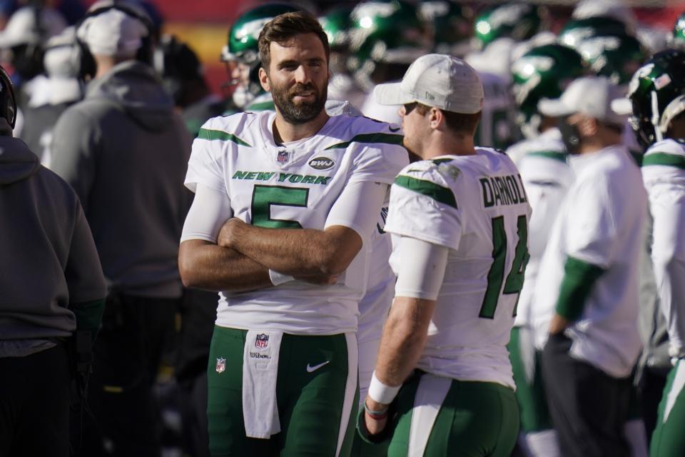 New York Jets' Joe Flacco (5) and Sam Darnold (14) talk on the sideline late in the second half of an NFL football game against the Kansas City Chiefs on Sunday, Nov. 1, 2020, in Kansas City, Mo. (AP Photo/Jeff Roberson)