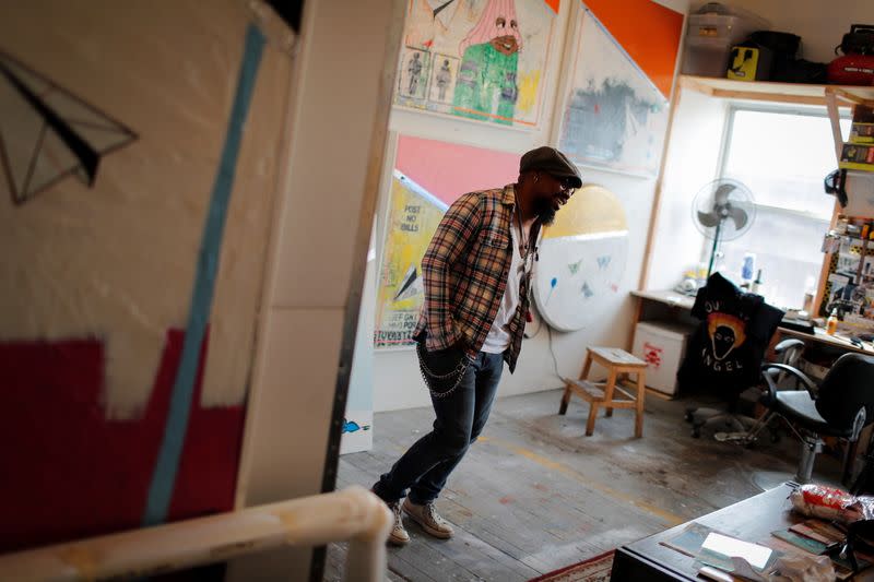 Artist Guy Stanley Philoche is pictured in his studio in the Harlem section of New York