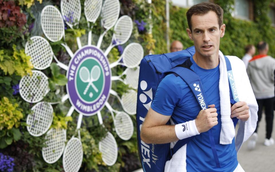 Andy Murray heads for the practice courts