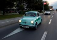 A converted supermini car Zastava 750, which has its combustion engine replaced with an electric one by BB Classic Cars, drives in Skopje