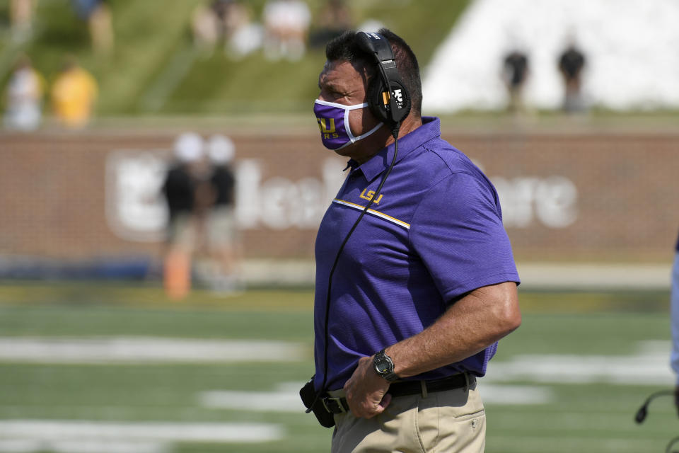 LSU head coach Ed Orgeron watches from the sidelines during the first half of an NCAA college football game against Missouri Saturday, Oct. 10, 2020, in Columbia, Mo. (AP Photo/L.G. Patterson)