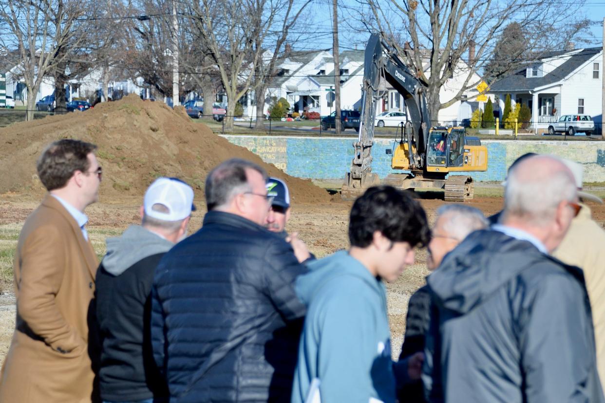 Construction continues at the site of the Hagerstown Field House on Tuesday, Dec. 12, 2023, while about 100 people attend a groundbreaking for the indoor sports facility.