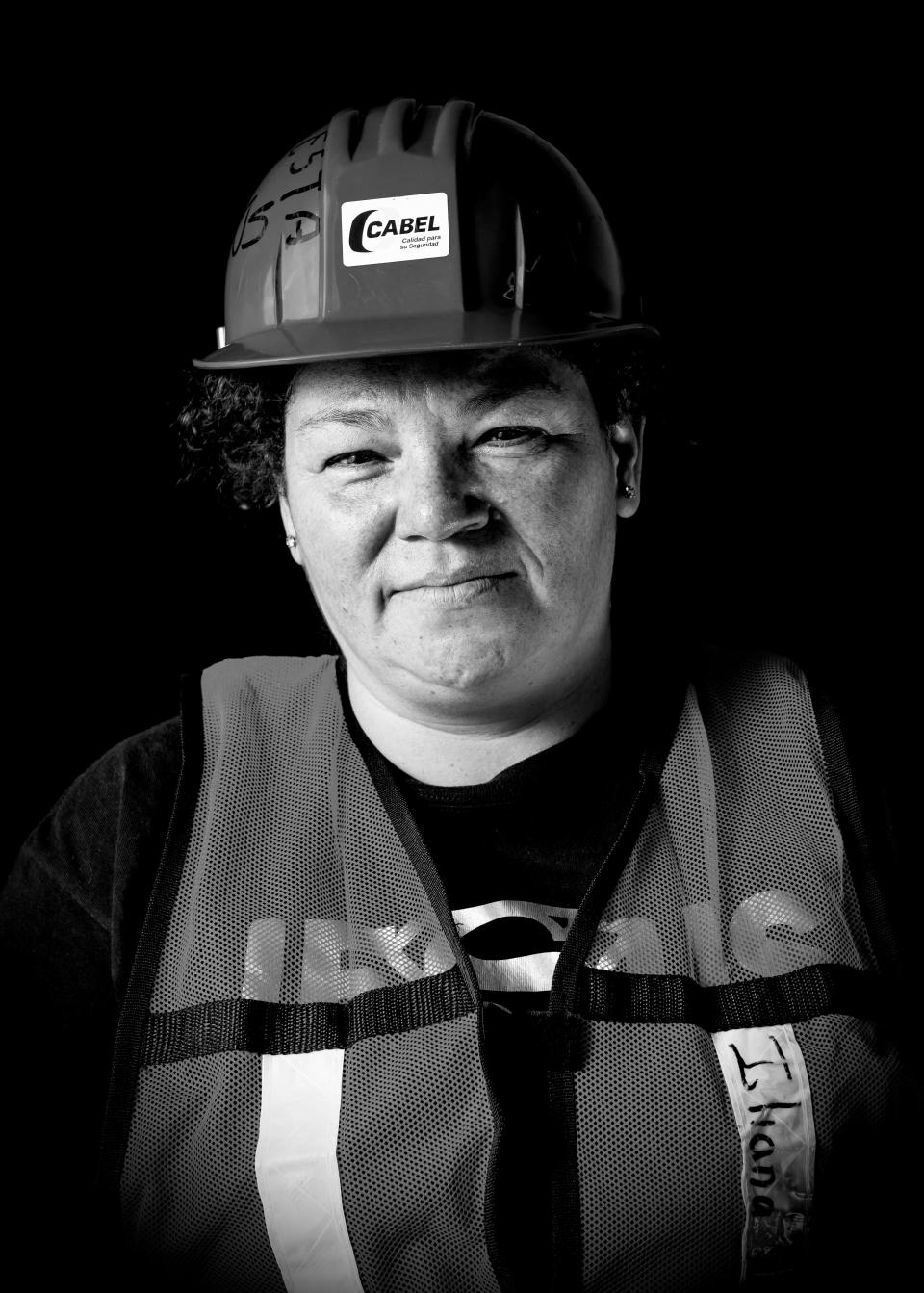 <p>Iliana Betzua, a 51-year-old nurse who volunteered to give medical assistance, remove debris and unload provisions after the 7.1 earthquake that hit Mexico on Sept. 19, poses for pictures with a vest reading “God Blesses Those With Good Heart,” in Mexico City on Sept. 25, 2017. What struck Betzua the most was “the brotherhood” among the people. (Photo: Omar Torres/AFP/Getty Images) </p>