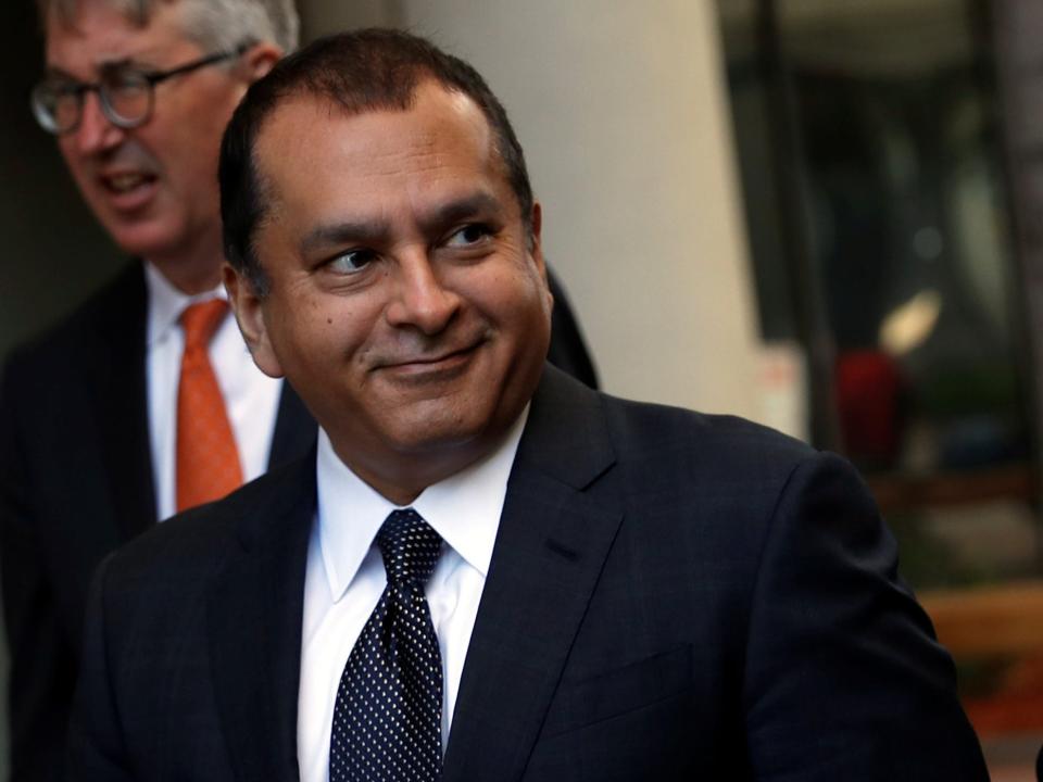 Former Theranos President and COO Ramesh "Sunny" Balwani smiles after a hearing at a federal court in San Jose, California, U.S., July 17, 2019.