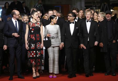 72nd Cannes Film Festival - Screening of the documentary film "Maradona" Out of Competition - Red Carpet Arrivals - Cannes, France, May 19, 2019. Director Asif Kapadia poses with a team. REUTERS/Stephane Mahe
