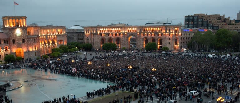 Tens of thousands protested in Armenia's capital against what they say is a power-grab by ex-president Serzh Sarkisian, as police arrested more than 230 people