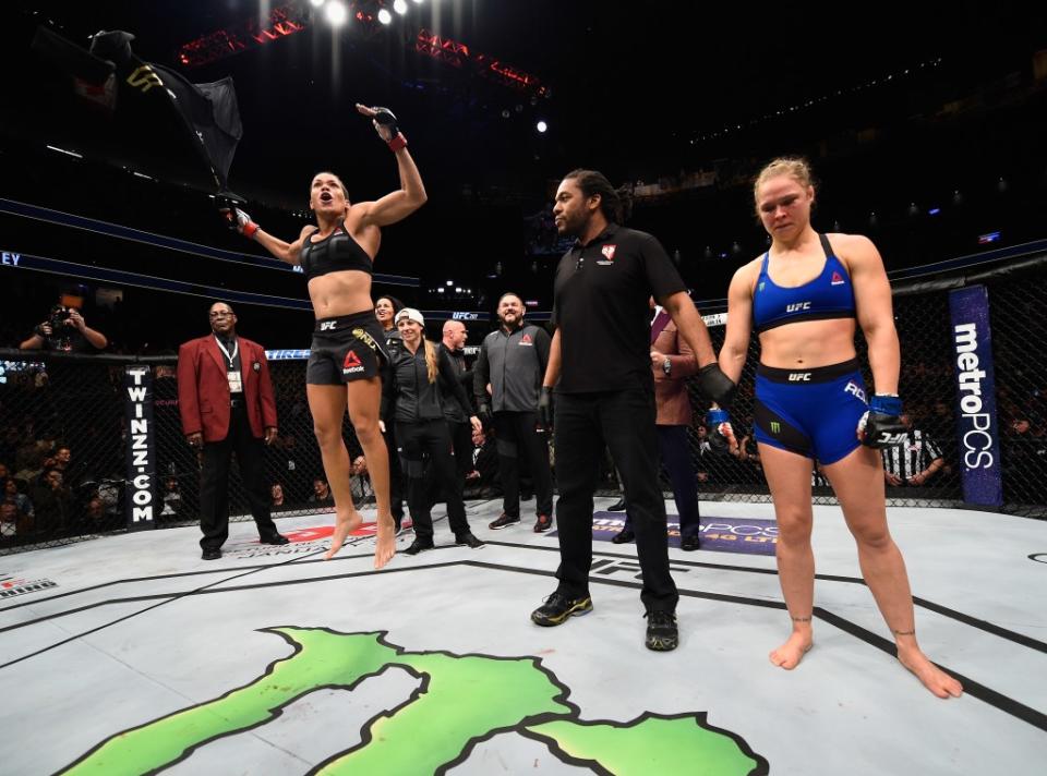 Rousey (R) on the mat with Amanda Nunes of Brazil during their now-legendary match in 2016. Zuffa LLC via Getty Images