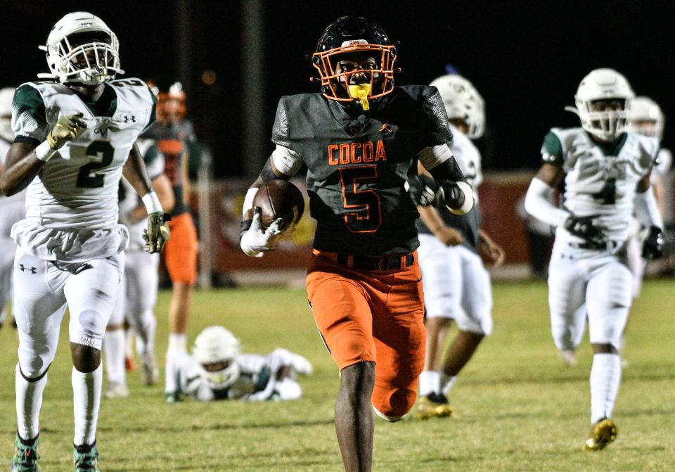 OJ Ross of Cocoa High runs 56 yards for a touchdown in the first quarter of the game against The Villages Charter Nov. 26, 2021. Craig Bailey/FLORIDA TODAY via USA TODAY NETWORK