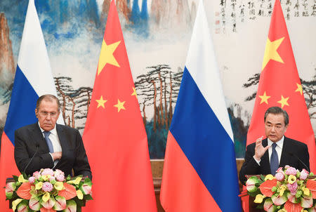 Chinese State Councilor and Foreign Minister Wang Yi speaks during his news conference with Russian Foreign Minister Sergei Lavrov at the Diaoyutai State Guest House in Beijing, China, April 23, 2018. Madoka Ikegami/Pool via REUTERS