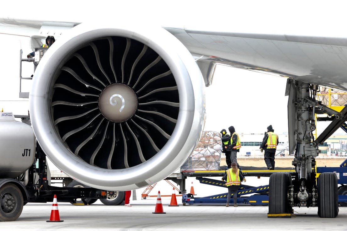 Freight is unloaded from an airplane on Thursday, March 3, 2022, at the Chicago Rockford International Airport in Rockford. The airport is expanding its international cargo operations with a new deal with London-based Menzies Aviation.