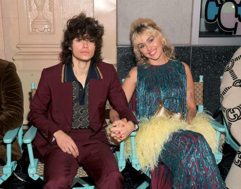 maxx morando and miley cyrus at the front row for guicci love parade on hollywood blvd on november 2, 2021 in los angeles, california photo by michael bucknerwwdpenske media via getty images